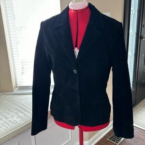 Leather (suede feel) jacket with front buttons and pockets.